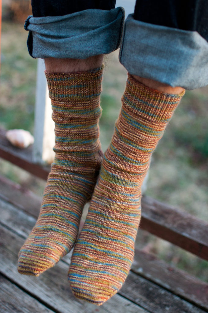 The softest socks he has. | knit the hell out